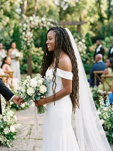 Loose locs with a veil